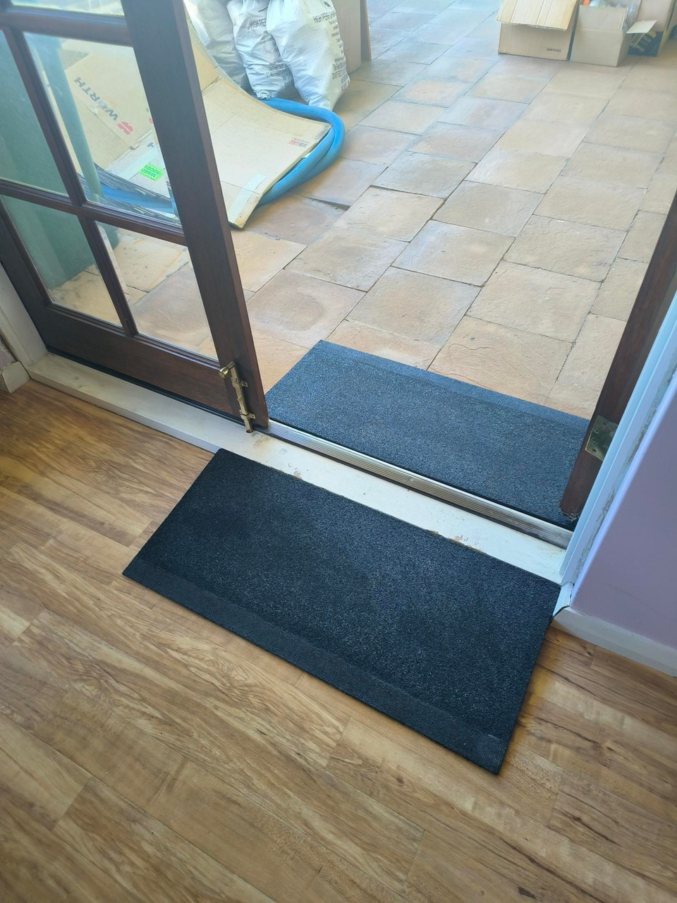 Rubber ramp fitted at a doorway threshold in Perth